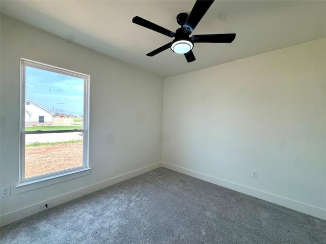 5501 Hollow Loop, Salado, TX 76571 - unfurnished room with carpet floors, baseboards, and ceiling fan