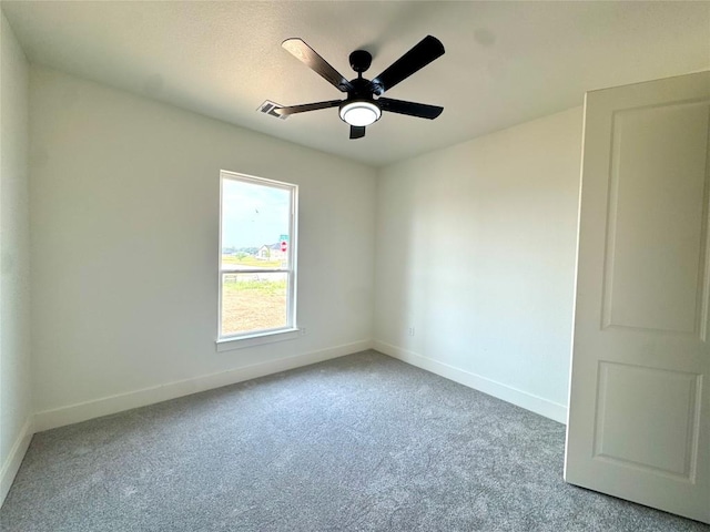 5501 Hollow Loop, Salado, TX 76571 - spare room featuring baseboards, carpet flooring, and ceiling fan