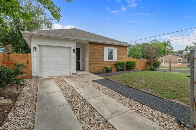 4801 Louis Ave Unit 1, Austin, TX 78721 - view of front of property featuring driveway and a garage
