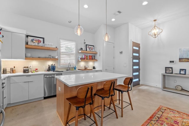 4801 Louis Ave Unit 1, Austin, TX 78721 - kitchen with dishwasher, open shelves, decorative backsplash, a kitchen island, and a kitchen bar