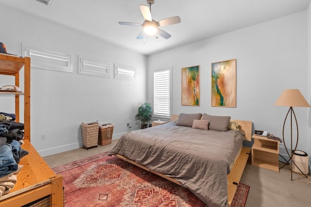 4801 Louis Ave Unit 1, Austin, TX 78721 - bedroom featuring carpet floors, baseboards, and a ceiling fan