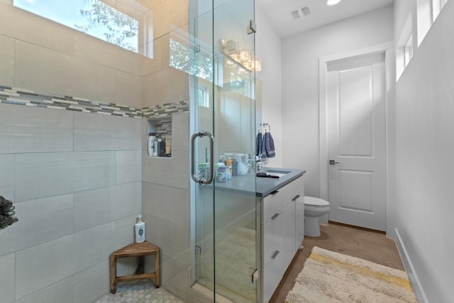 4801 Louis Ave Unit 1, Austin, TX 78721 - bathroom with a shower stall, vanity, and toilet