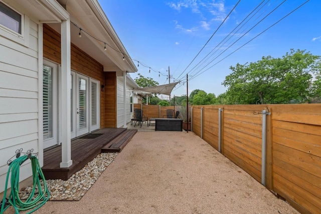 4801 Louis Ave Unit 1, Austin, TX 78721 - fenced backyard featuring a deck and a patio