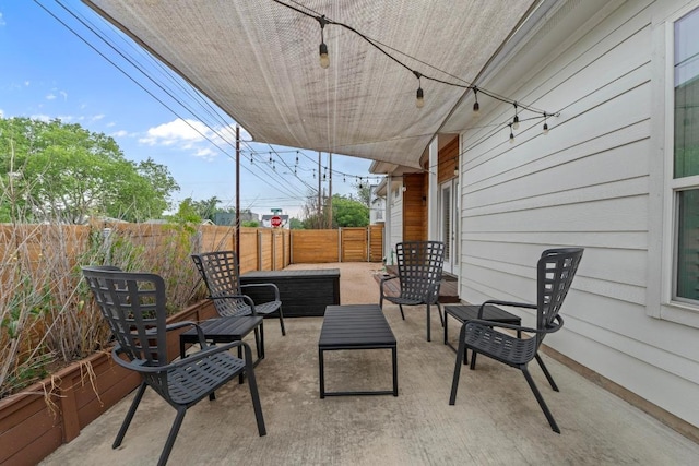 4801 Louis Ave Unit 1, Austin, TX 78721 - view of patio featuring a fenced backyard and an outdoor living space