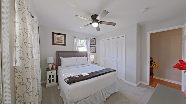 1127 Penion Dr, Austin, TX 78748 - bedroom with a closet, light colored carpet, and a ceiling fan