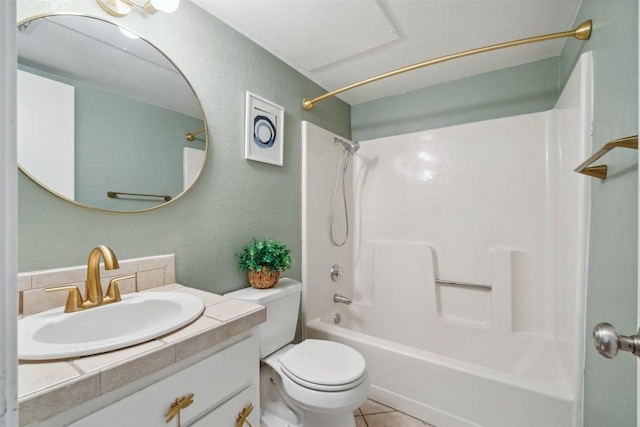 2104 Cullen Ave Unit 223, Austin, TX 78757 - full bathroom featuring toilet, bathing tub / shower combination, vanity, and a textured wall