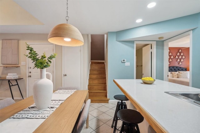 2104 Cullen Ave Unit 223, Austin, TX 78757 - dining area with stairway, recessed lighting, and light tile patterned floors