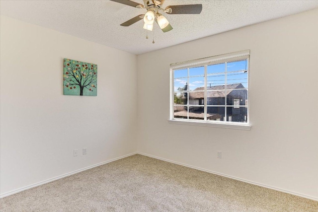 1905 Hollow Tree Blvd, Round Rock, TX 78681 - unfurnished room featuring carpet, ceiling fan, and a textured ceiling