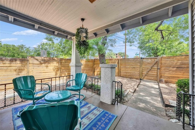 1901 E 10th St, Austin, TX 78702 - fenced backyard with a patio area and a gate
