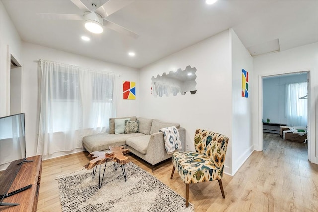 1901 E 10th St, Austin, TX 78702 - living area with a ceiling fan, light wood-style floors, baseboards, and recessed lighting
