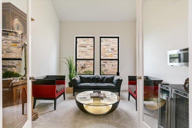 604 Rawson Bnd, Austin, TX 78738 - carpeted living area with beverage cooler and french doors