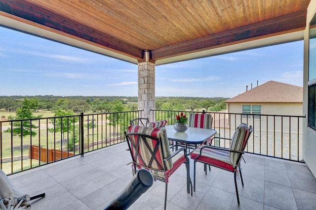 balcony featuring outdoor dining space