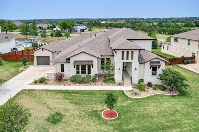 view of front of home featuring a shingled roof, stucco siding, stone siding, and concrete driveway