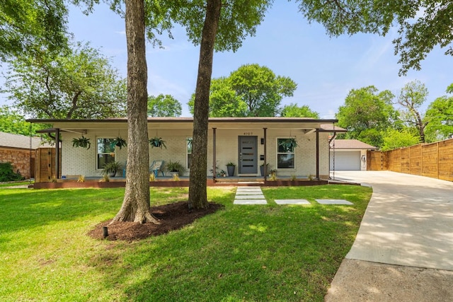 4107 Circletree Loop, Austin, TX 78731 - view of front of home featuring covered porch, brick siding, driveway, and a garage