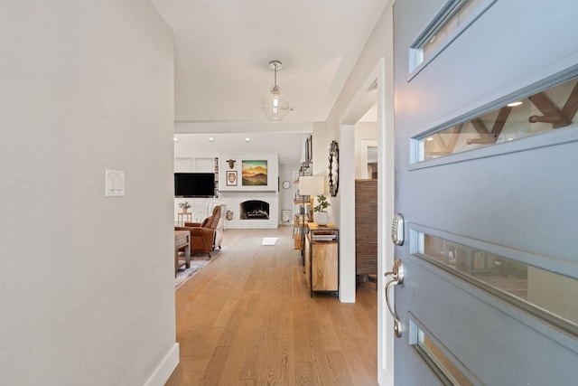 4107 Circletree Loop, Austin, TX 78731 - hall with light wood-style flooring and baseboards