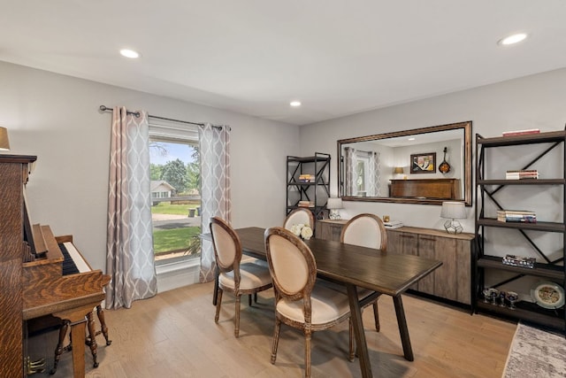 4107 Circletree Loop, Austin, TX 78731 - dining room with light wood-style flooring and recessed lighting
