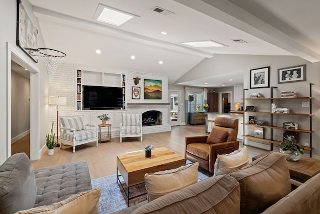 4107 Circletree Loop, Austin, TX 78731 - living area with light wood-style flooring, a fireplace, and recessed lighting