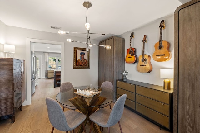 4107 Circletree Loop, Austin, TX 78731 - dining space with light wood finished floors