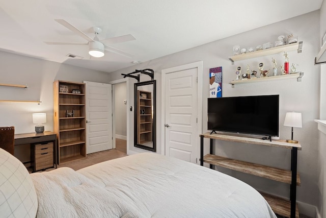 4107 Circletree Loop, Austin, TX 78731 - bedroom featuring a ceiling fan and wood finished floors