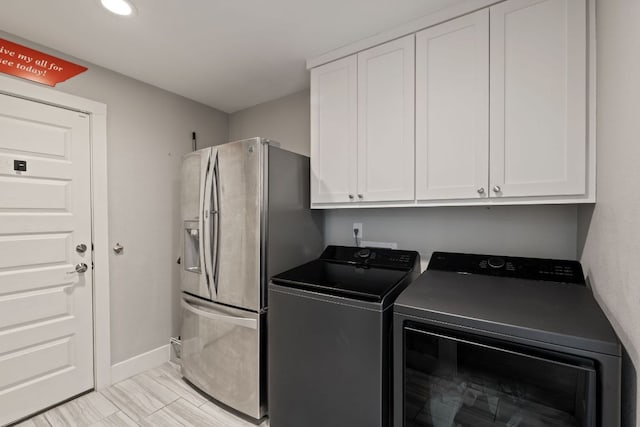 4107 Circletree Loop, Austin, TX 78731 - laundry area featuring cabinet space, separate washer and dryer, and recessed lighting