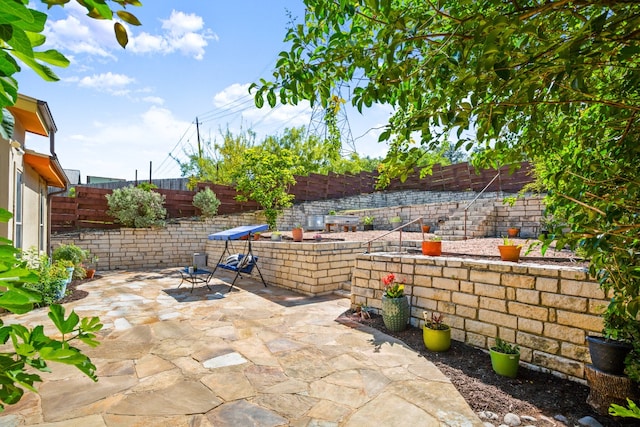 5309 Sendero Hills Pkwy, Austin, TX 78724 - fenced backyard featuring a patio area