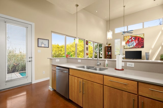 5309 Sendero Hills Pkwy, Austin, TX 78724 - kitchen with dishwasher, a sink, light countertops, a high ceiling, and a ceiling fan