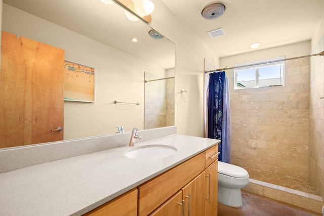 5309 Sendero Hills Pkwy, Austin, TX 78724 - bathroom with vanity, toilet, and a tile shower