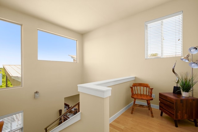 5309 Sendero Hills Pkwy, Austin, TX 78724 - corridor with plenty of natural light, light wood-style floors, and an upstairs landing
