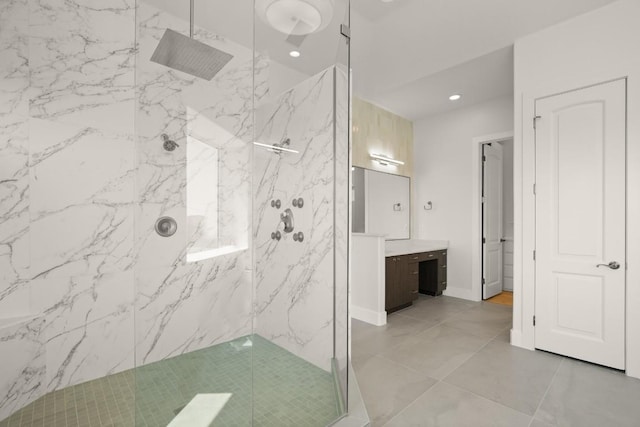 3401 Day Star Cv, Austin, TX 78746 - bathroom featuring a marble finish shower, vanity, and recessed lighting