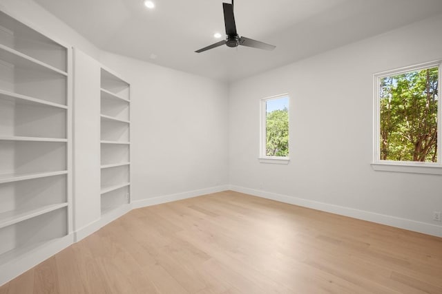 3401 Day Star Cv, Austin, TX 78746 - unfurnished room featuring healthy amount of natural light, baseboards, light wood finished floors, ceiling fan, and recessed lighting