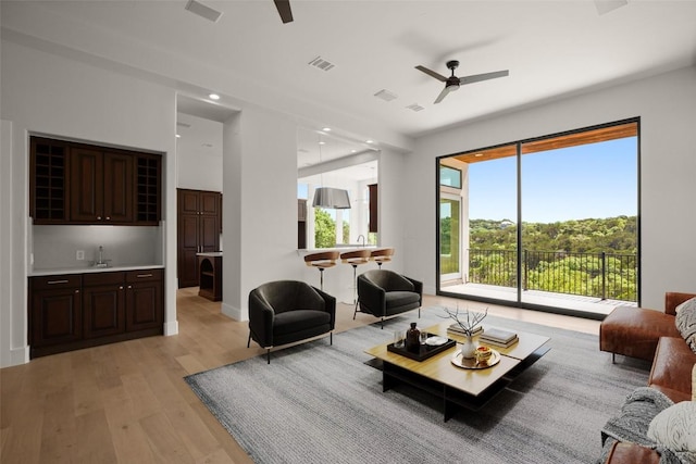 3401 Day Star Cv, Austin, TX 78746 - living area with ceiling fan, light wood-style floors, and recessed lighting