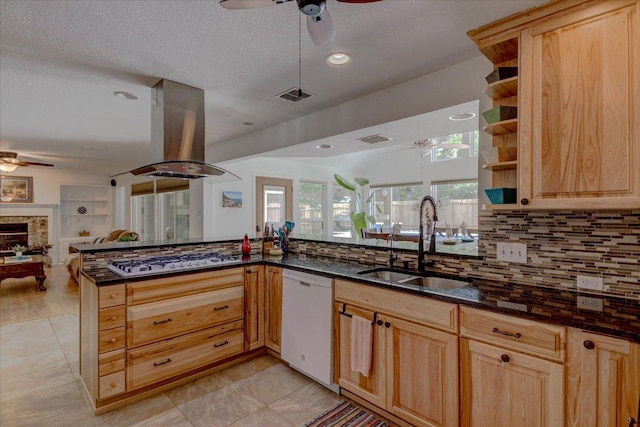 6022 Abilene Trl, Austin, TX 78749 - kitchen featuring dishwasher, a ceiling fan, stainless steel gas cooktop, open floor plan, and backsplash