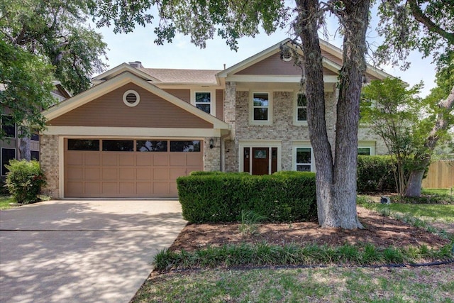 6022 Abilene Trl, Austin, TX 78749 - view of front facade with driveway, an attached garage, and brick siding