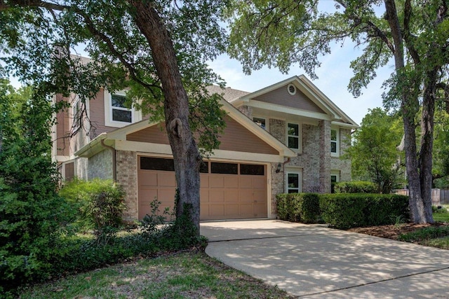 6022 Abilene Trl, Austin, TX 78749 - view of front of property with driveway, a garage, and brick siding