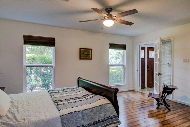 6022 Abilene Trl, Austin, TX 78749 - bedroom featuring hardwood / wood-style flooring and a ceiling fan