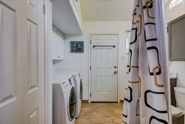 6022 Abilene Trl, Austin, TX 78749 - laundry area with washer and clothes dryer and cabinet space