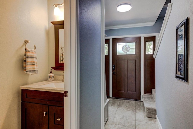 6022 Abilene Trl, Austin, TX 78749 - foyer entrance with ornamental molding and a textured wall