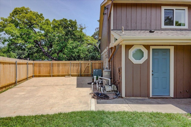6022 Abilene Trl, Austin, TX 78749 - doorway to property featuring a patio area and board and batten siding