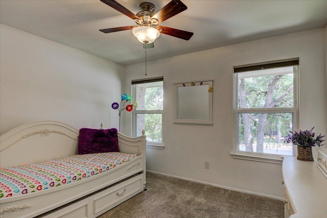 6022 Abilene Trl, Austin, TX 78749 - bedroom with carpet floors and ceiling fan