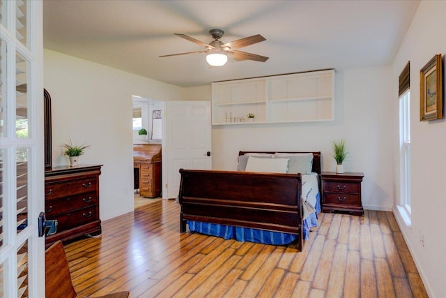 6022 Abilene Trl, Austin, TX 78749 - bedroom with wood-type flooring and ceiling fan