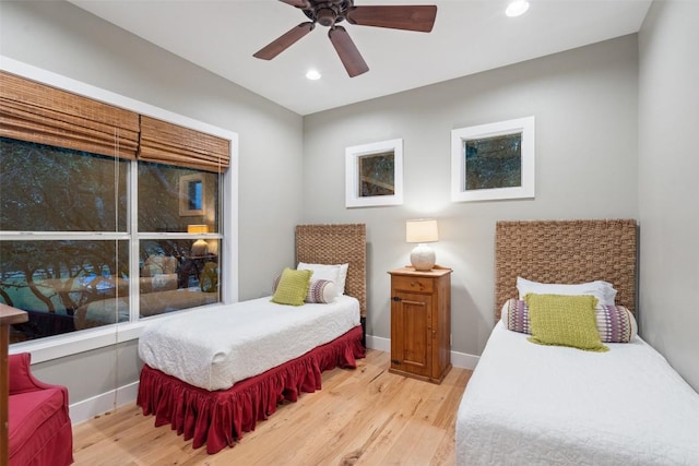 1348 Lake Shore Dr, Spicewood, TX 78669 - bedroom with wood finished floors, recessed lighting, baseboards, and a ceiling fan