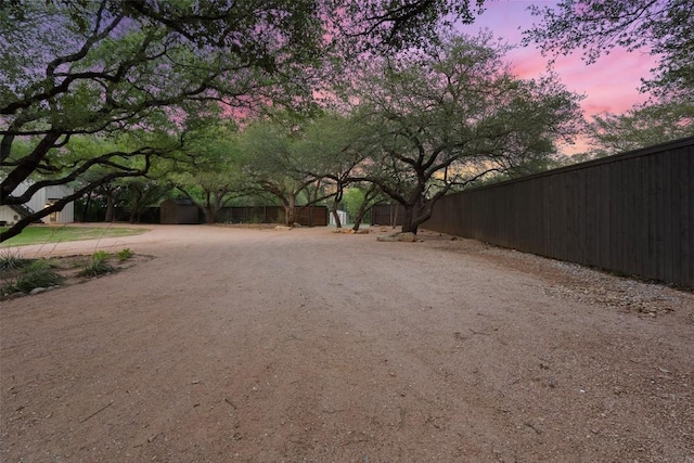 1348 Lake Shore Dr, Spicewood, TX 78669 - view of dirt / gravel road
