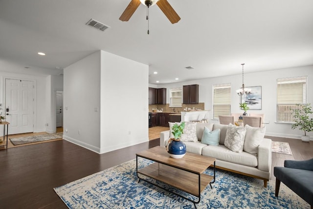 11325 Kirkland Hill Path, Austin, TX 78754 - living area featuring ceiling fan, baseboards, recessed lighting, healthy amount of natural light, and wood finished floors