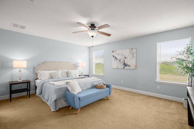 11325 Kirkland Hill Path, Austin, TX 78754 - bedroom featuring baseboards, light carpet, and a ceiling fan