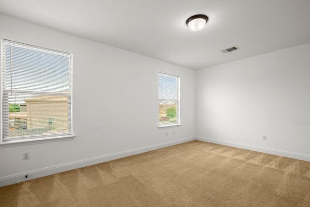 11325 Kirkland Hill Path, Austin, TX 78754 - spare room featuring light colored carpet and baseboards