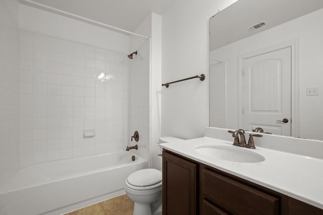 11325 Kirkland Hill Path, Austin, TX 78754 - bathroom with toilet, vanity, bathtub / shower combination, and tile patterned floors