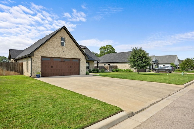 121 Gloria Blvd, Smithville, TX 78957 - view of front of property with concrete driveway, brick siding, an attached garage, and roof with shingles