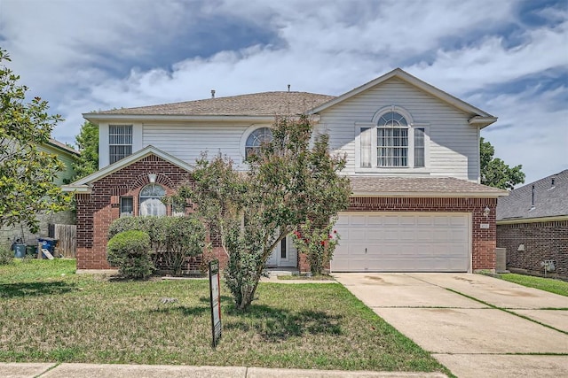 4712 Ramies Run, Austin, TX 78749 - view of front of house featuring brick siding, concrete driveway, a garage, and a front yard