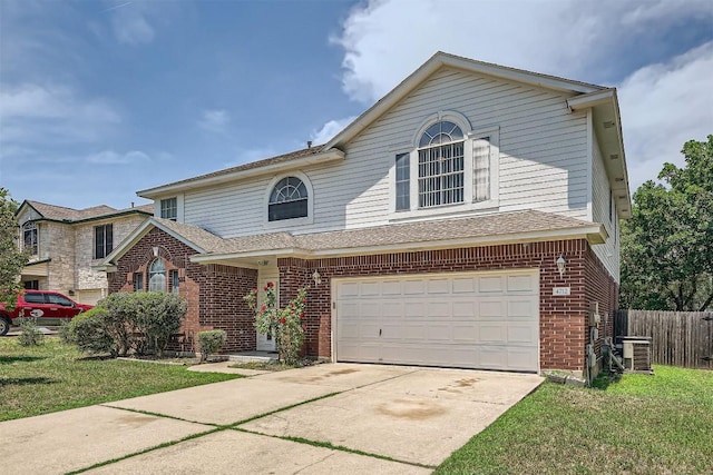 4712 Ramies Run, Austin, TX 78749 - view of front of home featuring a garage, brick siding, and driveway