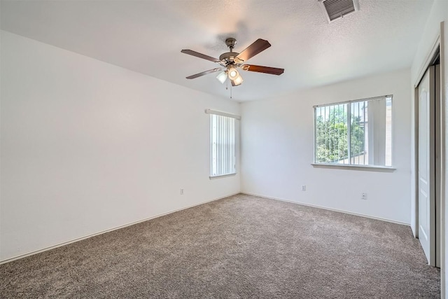 4712 Ramies Run, Austin, TX 78749 - empty room featuring carpet and a ceiling fan